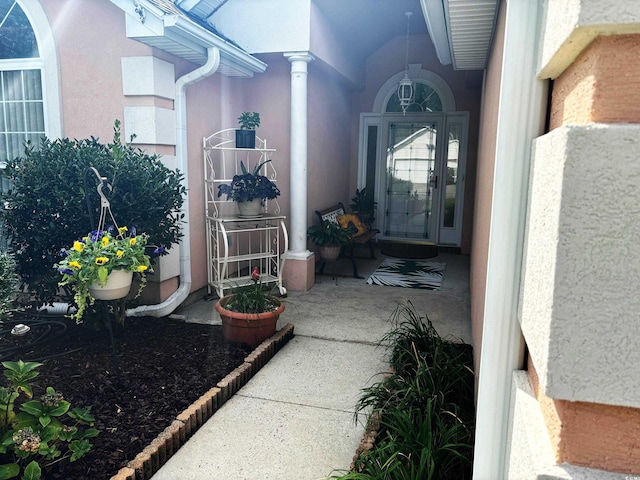 entrance to property with a patio