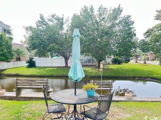 view of patio / terrace featuring a water view