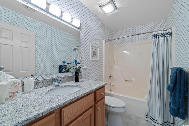 full bathroom with tile patterned flooring, vanity, shower / bath combination with curtain, and toilet