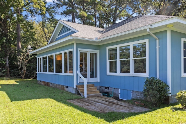 view of home's exterior featuring a lawn