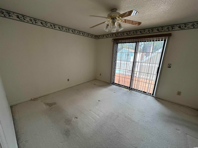 unfurnished room with light carpet, a textured ceiling, and ceiling fan