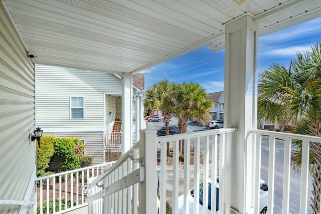 balcony featuring covered porch