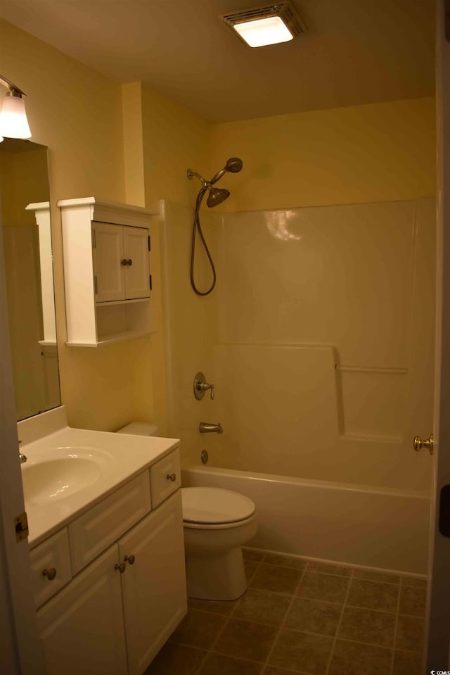 full bathroom with vanity, bathing tub / shower combination, and toilet