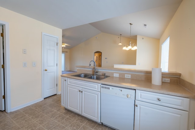 kitchen with visible vents, white cabinets, lofted ceiling, white dishwasher, and a sink