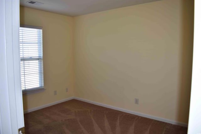 view of carpeted spare room