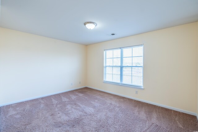 laundry area featuring dark tile patterned floors, independent washer and dryer, and electric panel