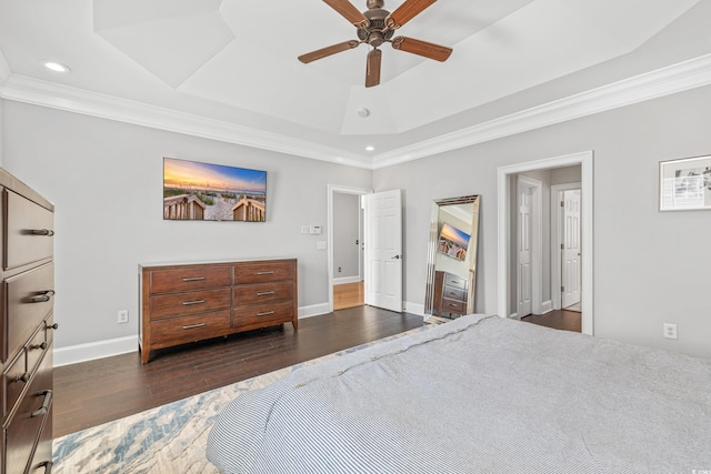 bedroom featuring ceiling fan, ornamental molding, and dark hardwood / wood-style floors