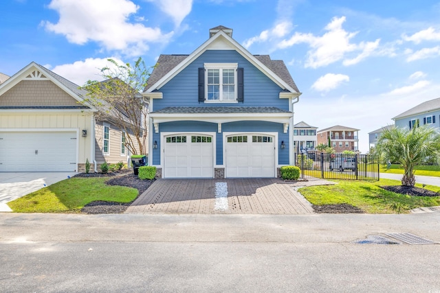 craftsman-style home with a garage