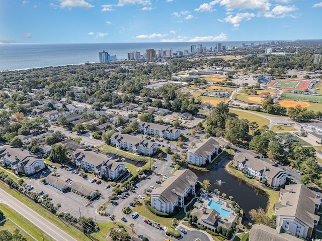 drone / aerial view with a water view