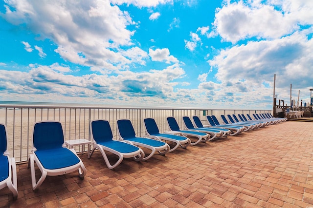 view of patio / terrace featuring a water view