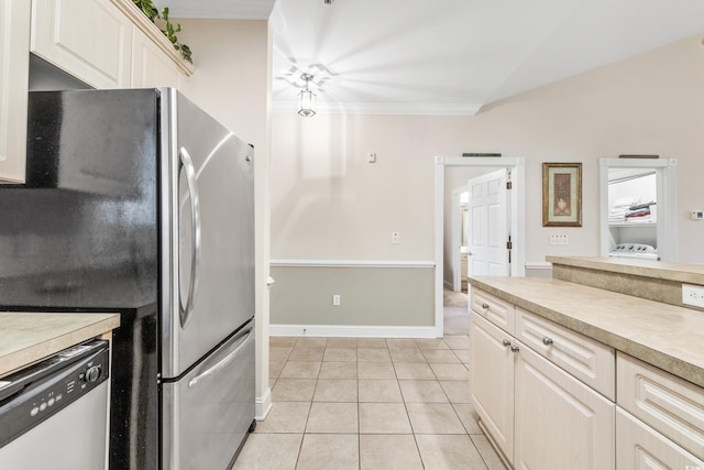 kitchen featuring appliances with stainless steel finishes and light tile patterned floors