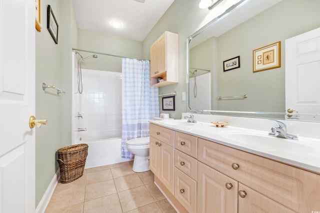 full bathroom featuring vanity, toilet, tile patterned floors, and shower / bath combination with curtain