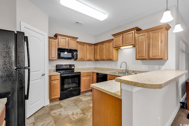 kitchen with kitchen peninsula, hanging light fixtures, black appliances, and sink