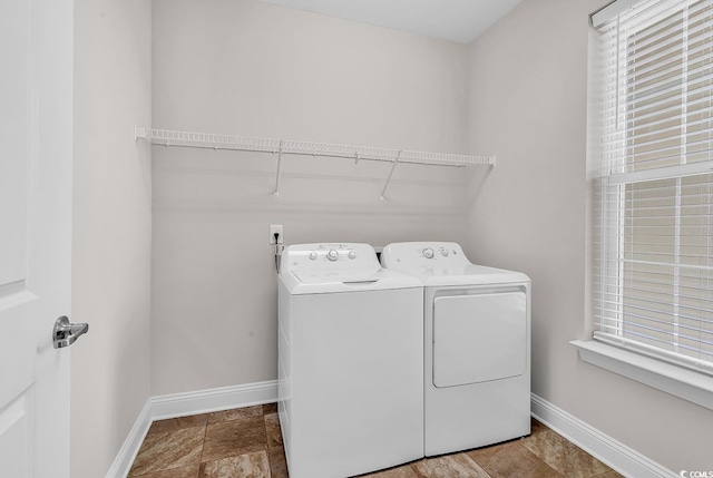 washroom featuring separate washer and dryer