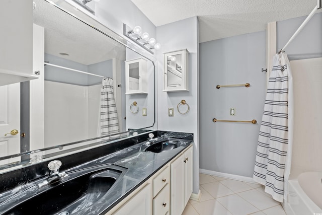 bathroom featuring vanity, tile patterned floors, a textured ceiling, and shower / bathtub combination with curtain