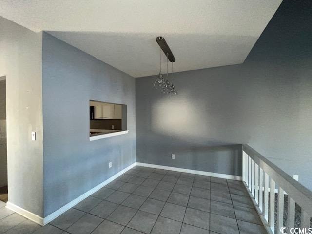 3831 Masters Ct Unit 137, Myrtle Beach, SC 29577 - unfurnished dining area featuring tile patterned floors, a chandelier, and vaulted ceiling