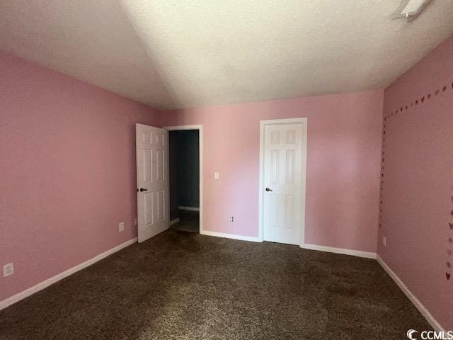 3831 Masters Ct Unit 137, Myrtle Beach, SC 29577 - unfurnished bedroom with dark carpet and baseboards