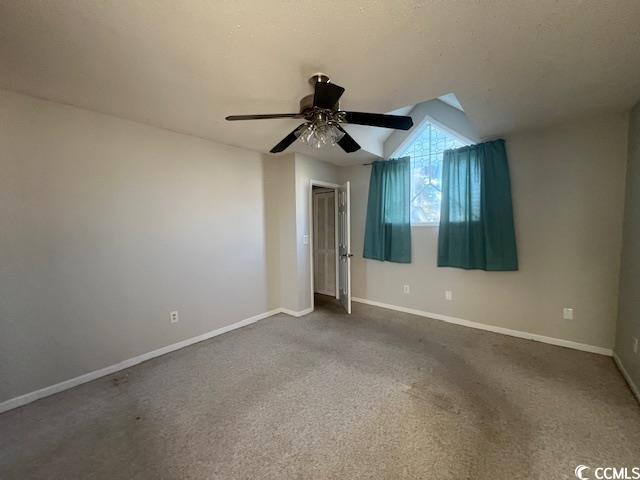 3831 Masters Ct Unit 137, Myrtle Beach, SC 29577 - unfurnished bedroom featuring lofted ceiling, carpet floors, and a ceiling fan