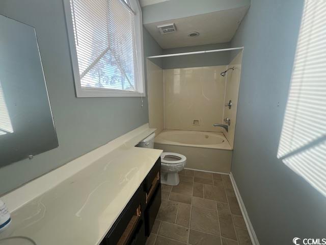3831 Masters Ct Unit 137, Myrtle Beach, SC 29577 - full bath with vanity, bathing tub / shower combination, and stone finish flooring