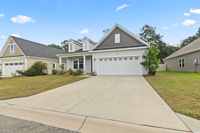 view of front facade with a garage and a front yard