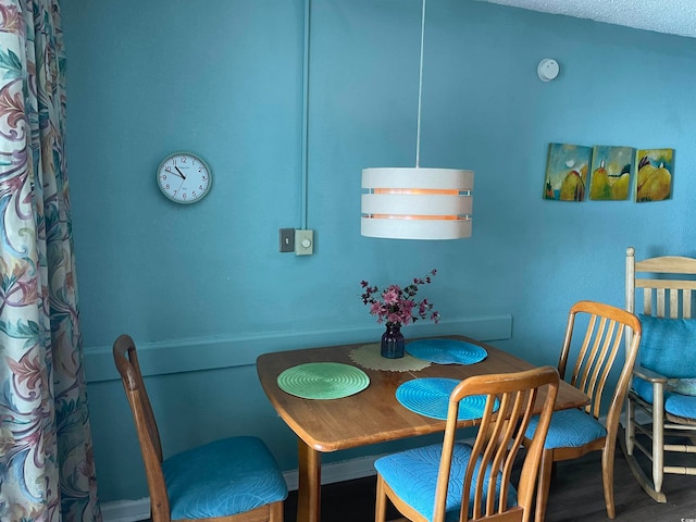 dining room featuring hardwood / wood-style flooring