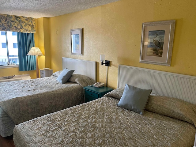 bedroom featuring a textured ceiling