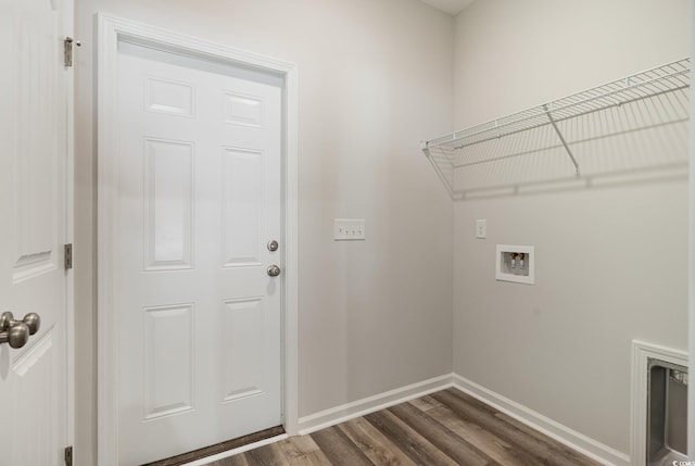 laundry room with dark hardwood / wood-style floors and hookup for a washing machine