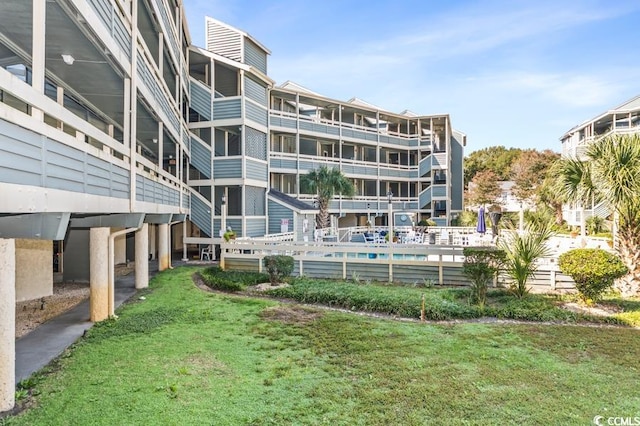 view of community featuring a yard
