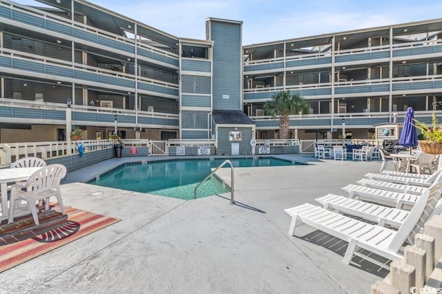 pool with a patio area