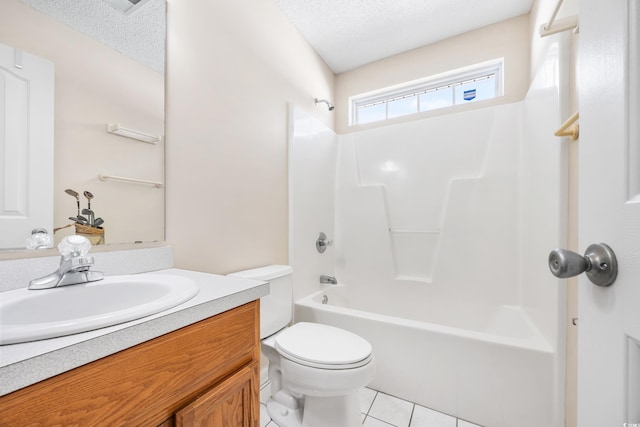 full bathroom featuring vanity, bathtub / shower combination, a textured ceiling, and toilet