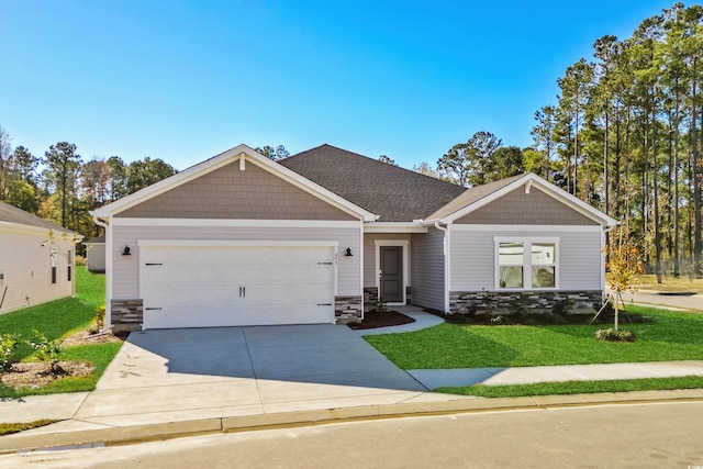 craftsman-style house with a front lawn and a garage