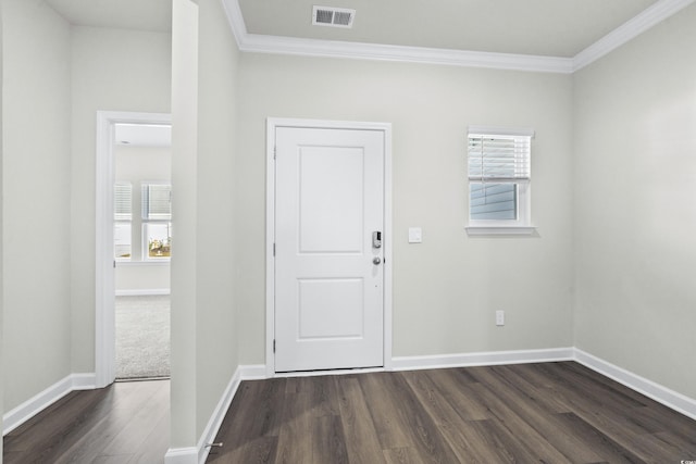 entryway featuring dark hardwood / wood-style flooring and ornamental molding