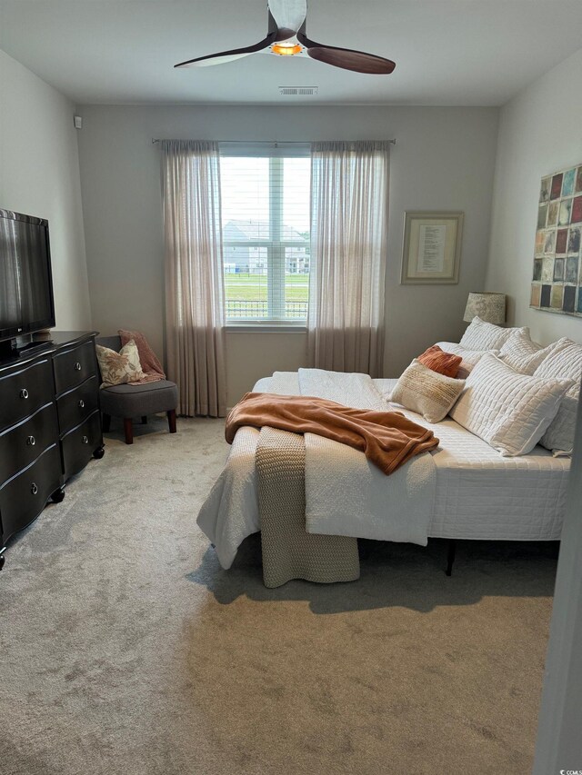 bedroom featuring carpet and ceiling fan