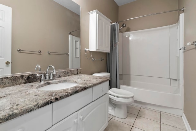 full bathroom featuring vanity, toilet, shower / bath combo with shower curtain, and tile patterned flooring