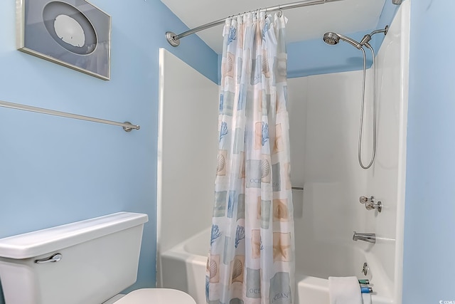 bathroom with toilet and shower / bathtub combination with curtain