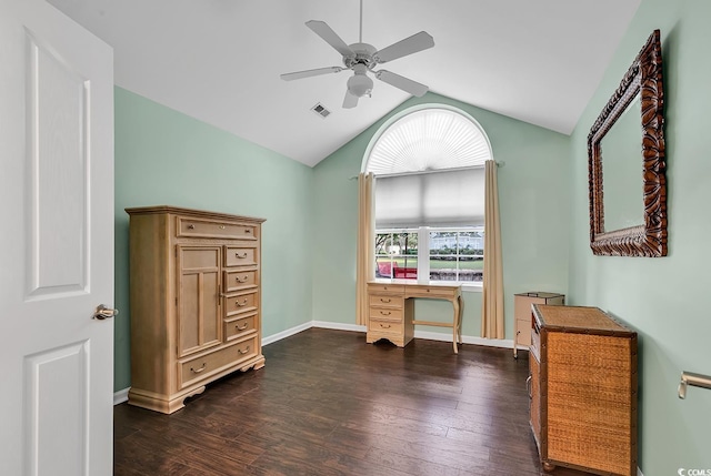 interior space featuring dark wood-type flooring, ceiling fan, and vaulted ceiling