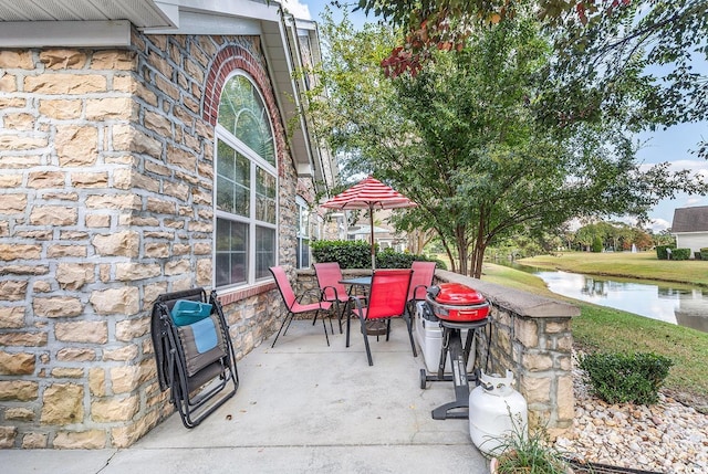 view of patio / terrace featuring a water view