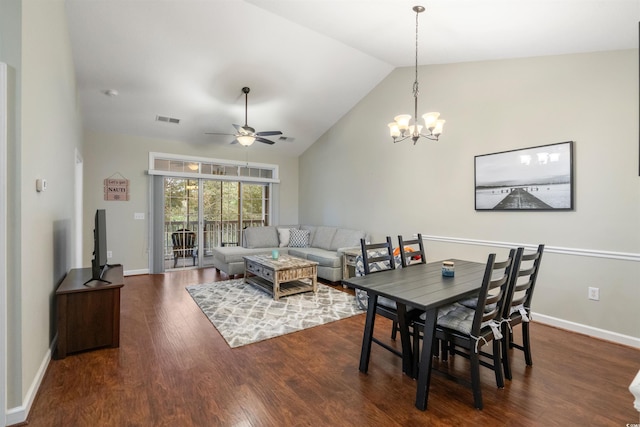 5750 Oyster Catcher Dr Unit 1134, North Myrtle Beach, SC 29582 - dining room featuring ceiling fan with notable chandelier, baseboards, visible vents, dark wood-type flooring, and high vaulted ceiling