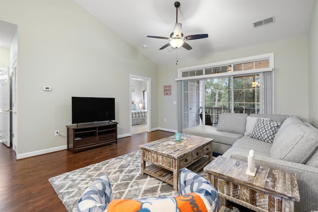 living room featuring ceiling fan, high vaulted ceiling, and dark hardwood / wood-style floors