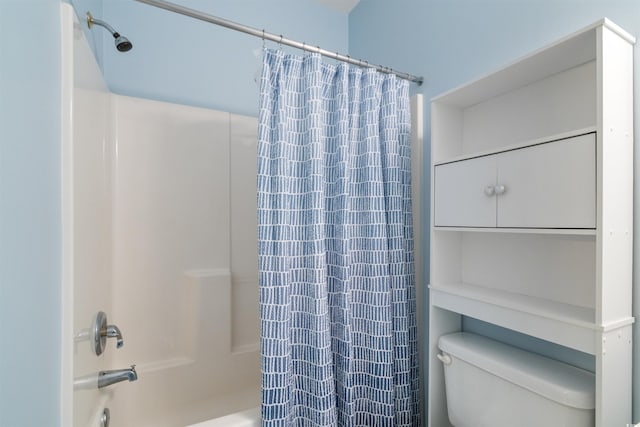 bathroom with toilet and shower / bath combo