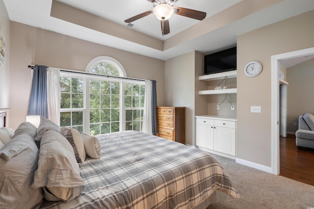 bedroom featuring dark hardwood / wood-style floors and ceiling fan