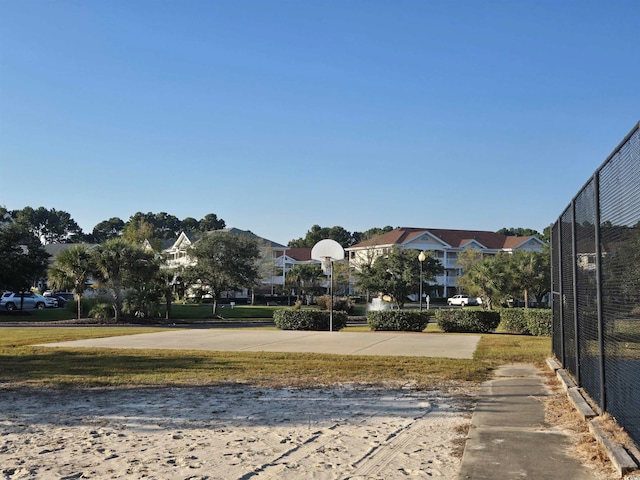 view of community featuring basketball court