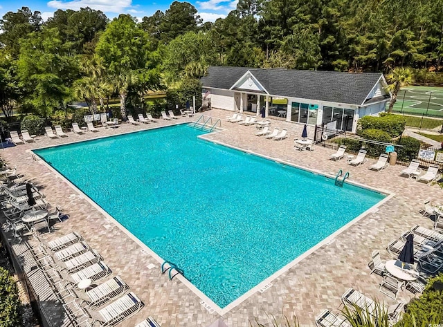 view of swimming pool with a patio