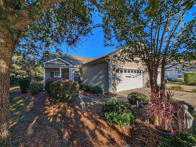 ranch-style home featuring a garage