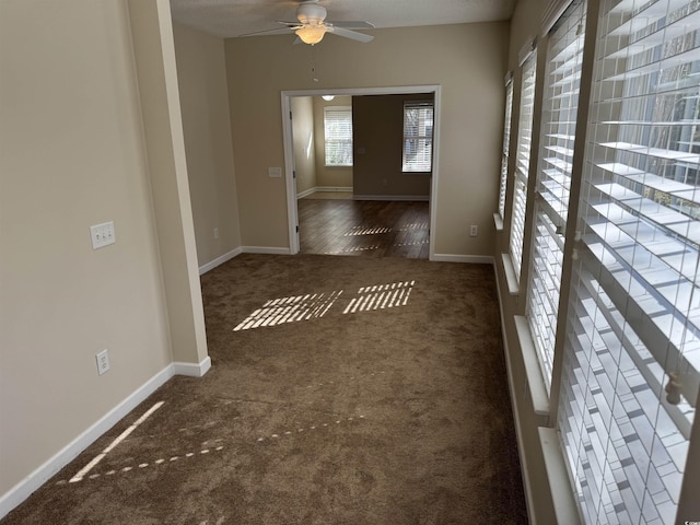 interior space with dark colored carpet