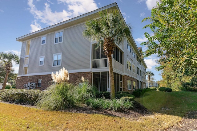 view of property exterior featuring a yard