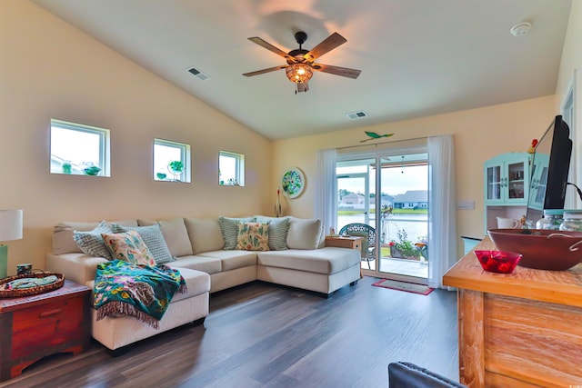 living room with dark hardwood / wood-style floors, ceiling fan, and vaulted ceiling