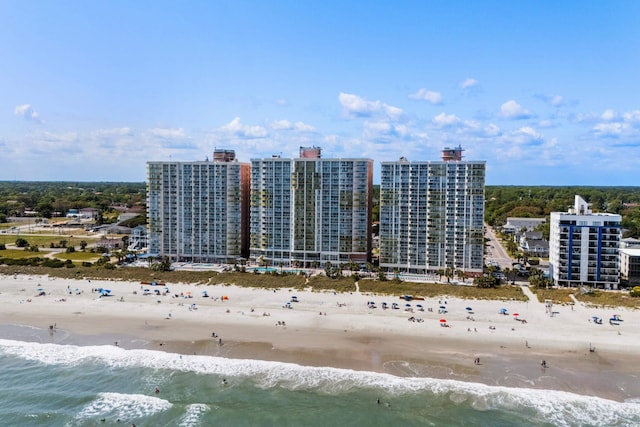 drone / aerial view with a view of the beach and a water view