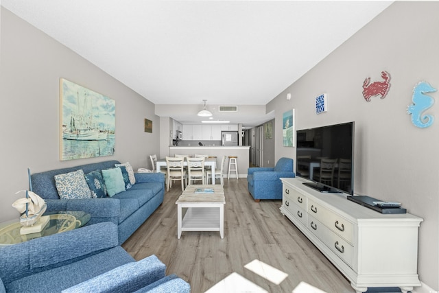 living room with light wood-type flooring