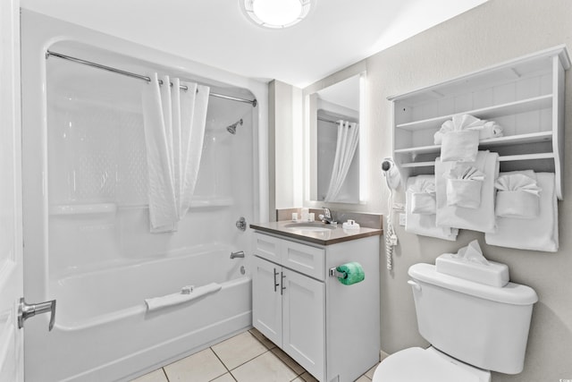 full bathroom with toilet, vanity,  shower combination, and tile patterned floors